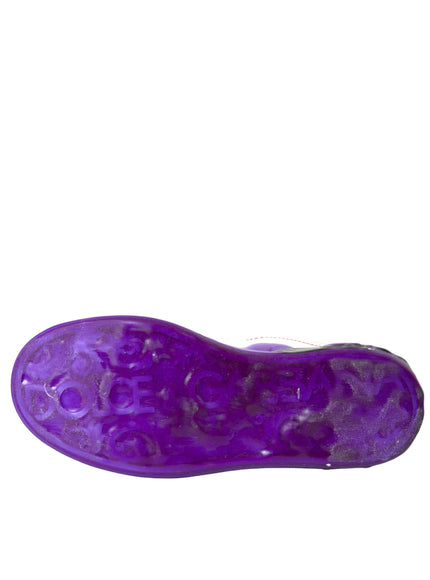 a close up of a purple shoe on a white background