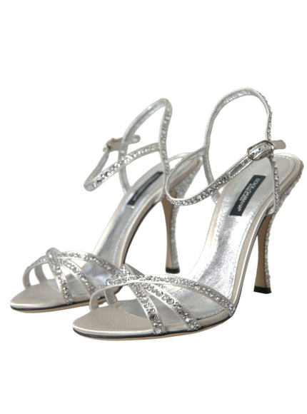 a pair of silver high heeled shoes