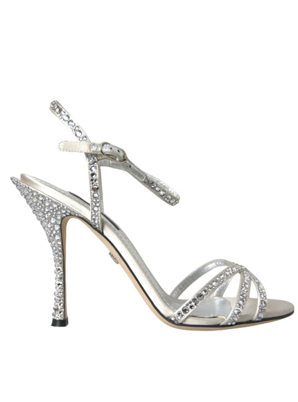 a women's silver high heeled sandal with a bow