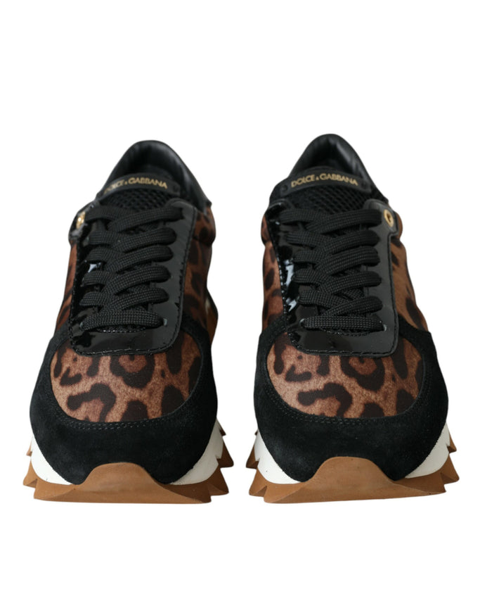 a pair of leopard print sneakers on a white background