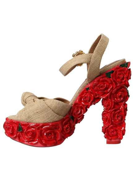 a pair of red shoes with roses on them