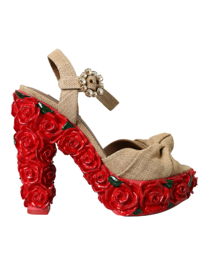 a pair of red shoes with flowers on them