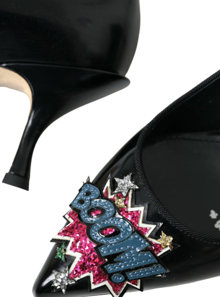 a pair of black high heels with colorful stars on them