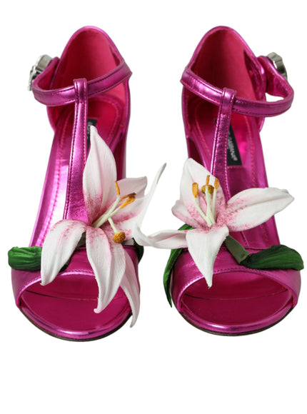 a pair of pink shoes with flowers on them