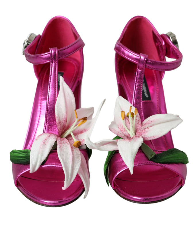 a pair of pink shoes with flowers on them