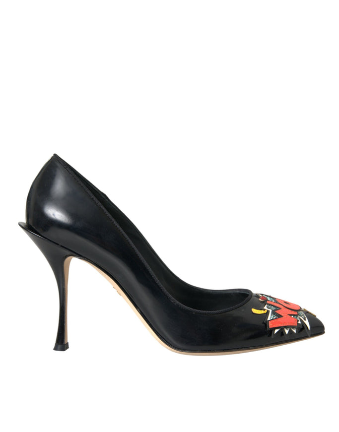 a black high heeled shoe with a dragon on the side