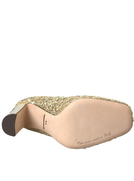 a pair of shoes with gold glitters on them