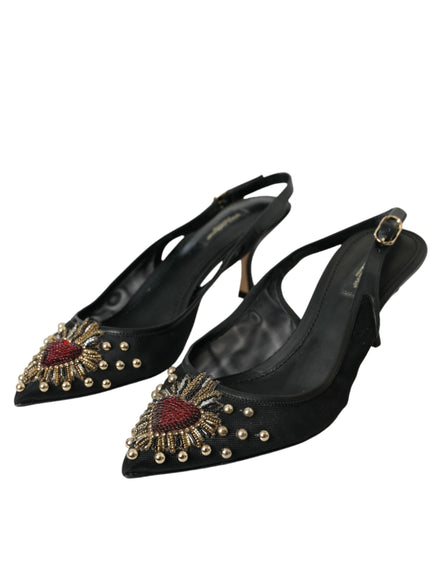 a pair of black high heels with gold and red beads