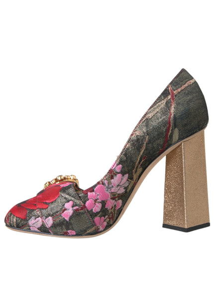 a women's shoe with a flower design on the heel