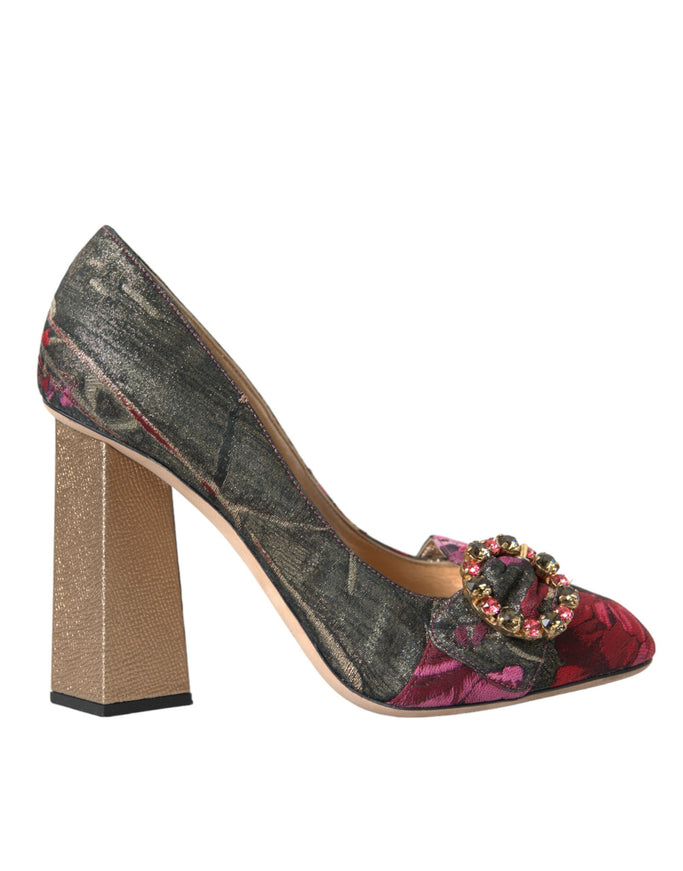 a women's shoe with a flower on the heel