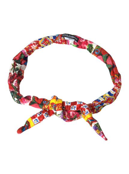 a multicolored headband with a bow on a white background