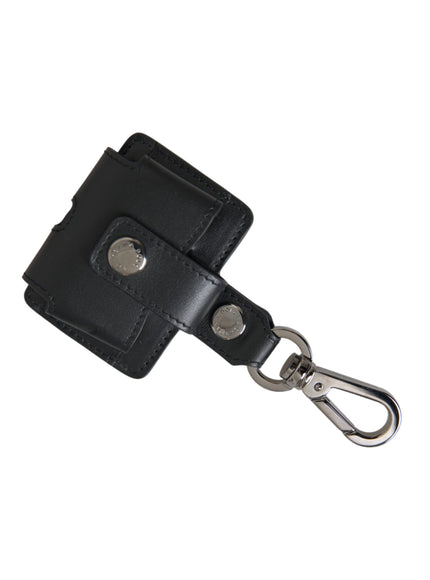 a black leather wallet with a metal clip