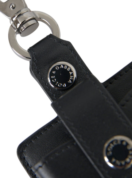 a black leather keychain with a metal ring