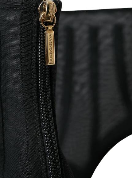 a close up of a zipper on a black bag