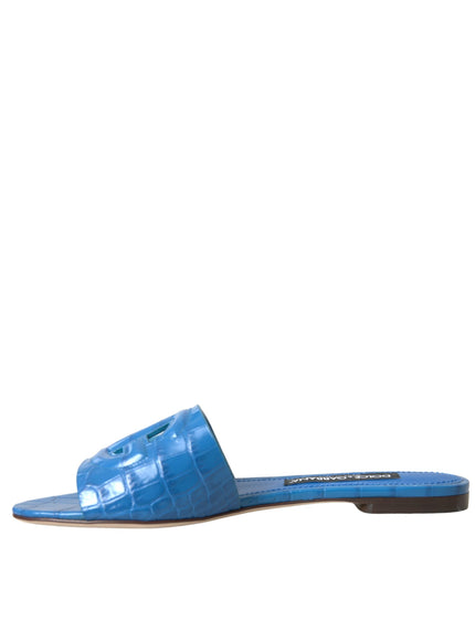 a women's blue slide on sandal