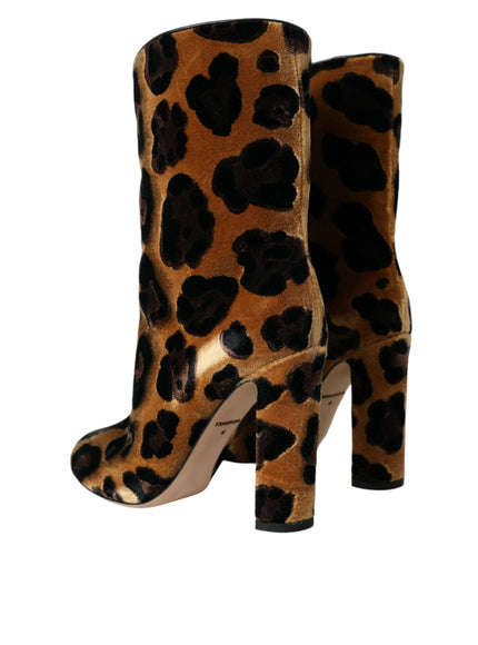 a pair of leopard print high heel boots