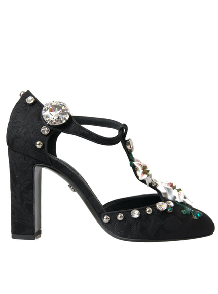 a pair of black high heeled shoes with jewel embellishments