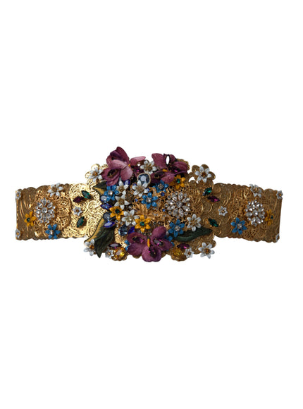 a close up of a bracelet with flowers on it