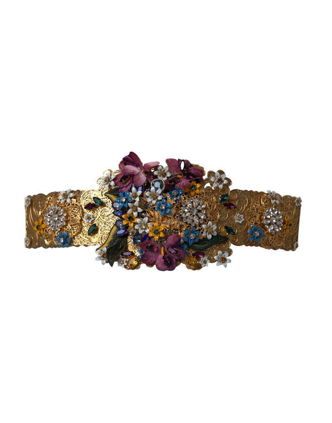 a close up of a bracelet with flowers on it