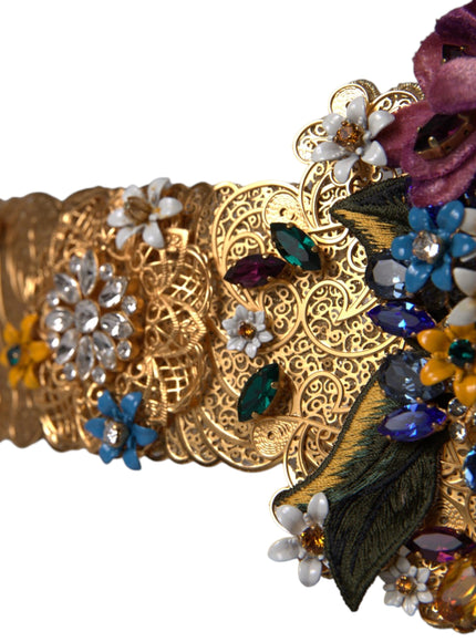 a close up of a bracelet with flowers on it