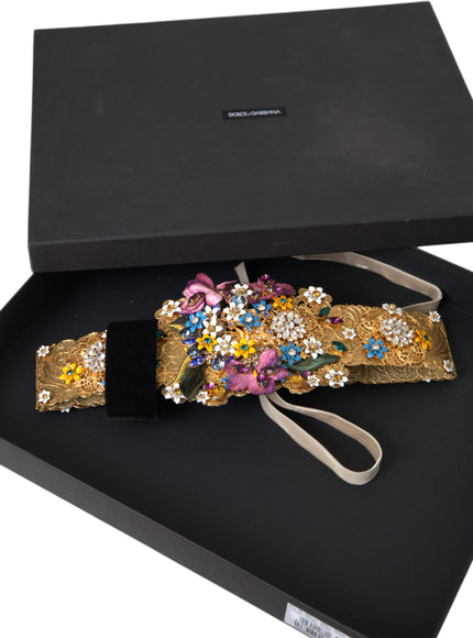 a black box with a gold and multicolored brocade on it