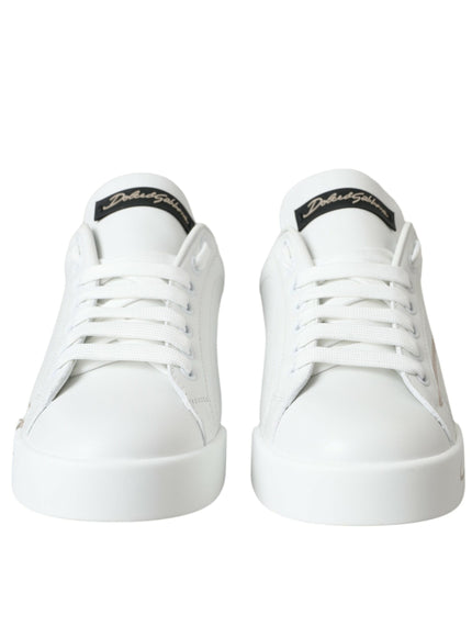 a pair of white sneakers on a white background