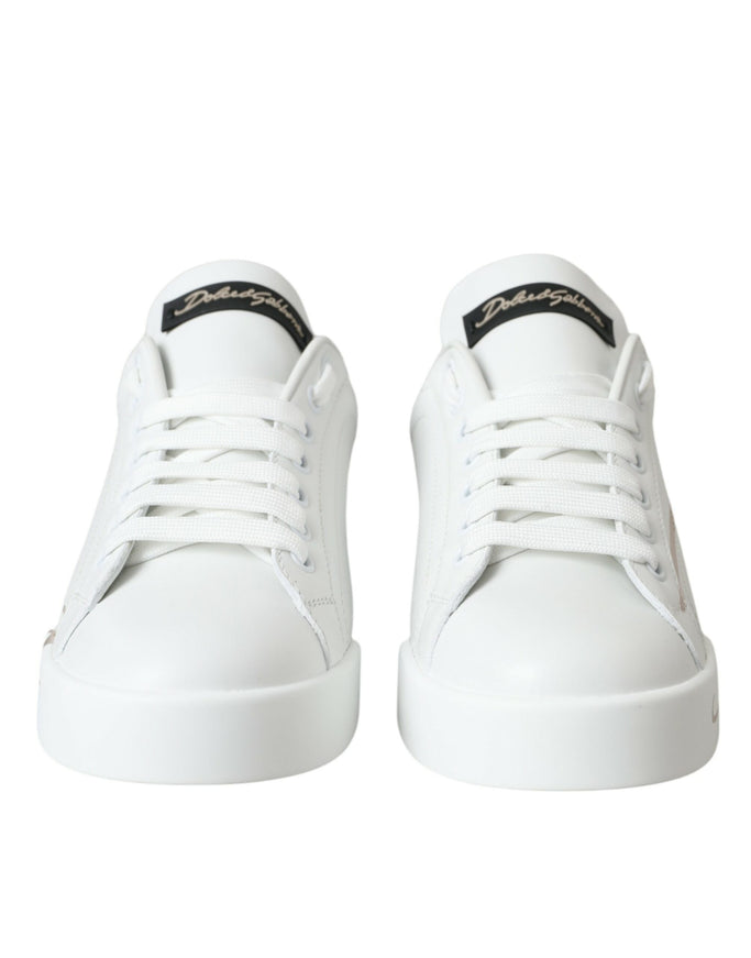 a pair of white sneakers on a white background