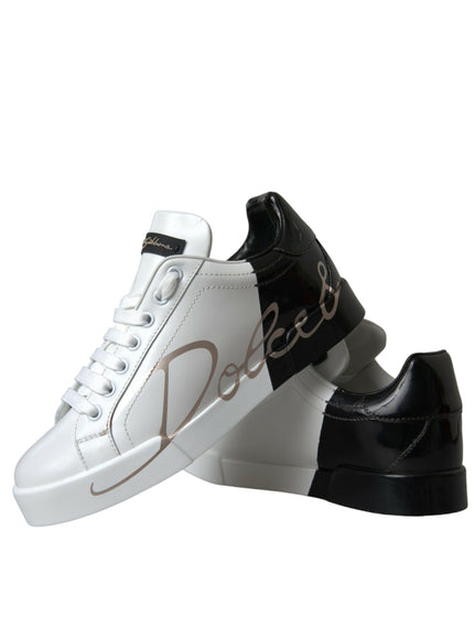 a pair of white and black sneakers with the word dolce on them