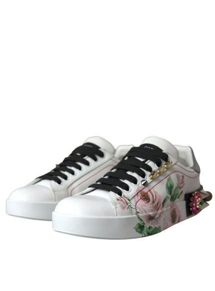 a pair of white sneakers with flowers on them