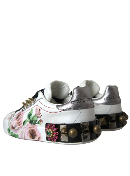 a pair of white shoes with flowers on them