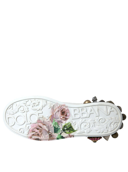 a white shoe with flowers painted on it