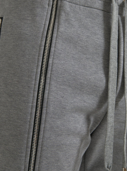 Close-up of gray jogger sweatpants zipper detail