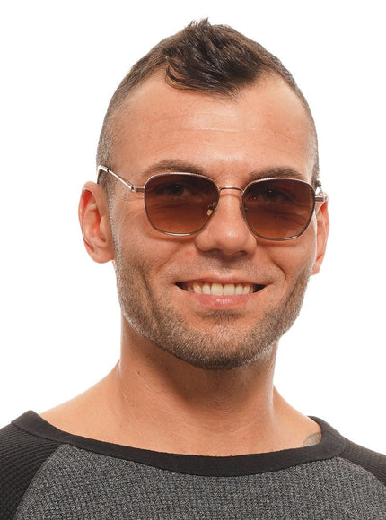 a man wearing sunglasses and a black shirt