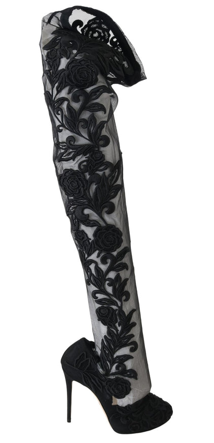 a high heeled shoe with black lace