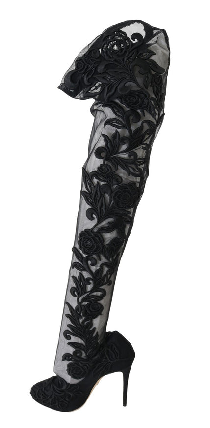 a high heeled shoe with black lace