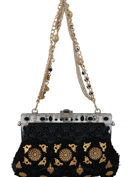 Back view of Dolce & Gabbana black tassel gold clutch