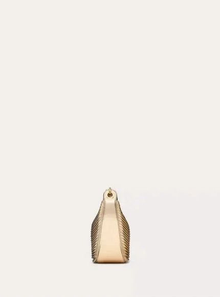 a small gold purse on a white background