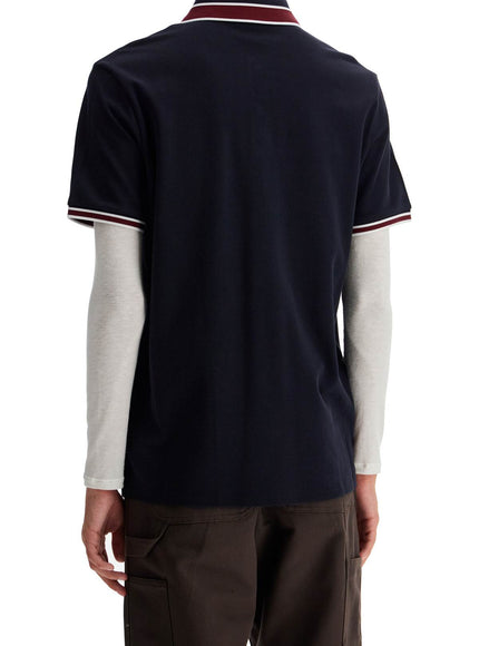 Moncler striped polo shirt with detailed accents