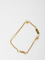M / Gold