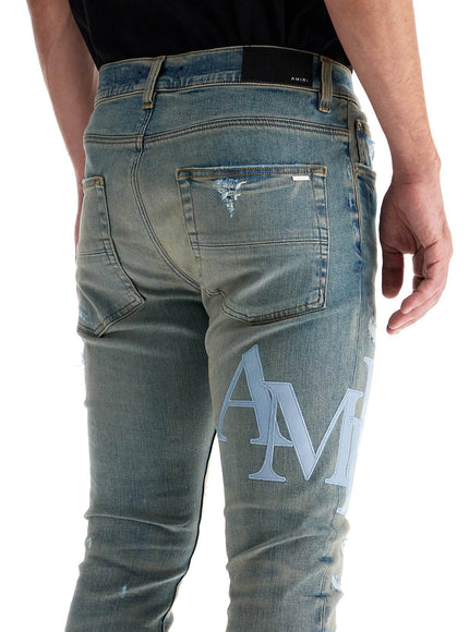 Amiri leather logo jeans with eight words