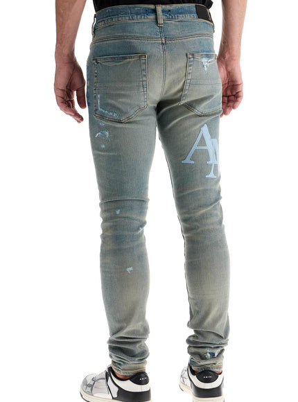 Amiri leather logo jeans with eight words