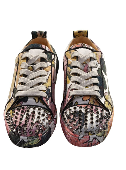 a pair of sneakers with floral designs on them