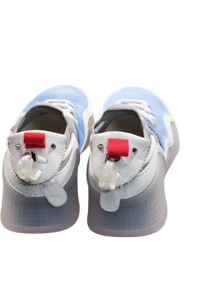 a pair of blue and white shoes on a white background