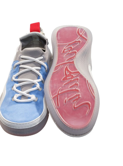 a pair of blue and pink sneakers with white laces