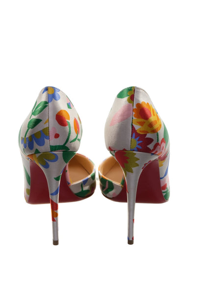 a pair of colorful high heeled shoes on a white background