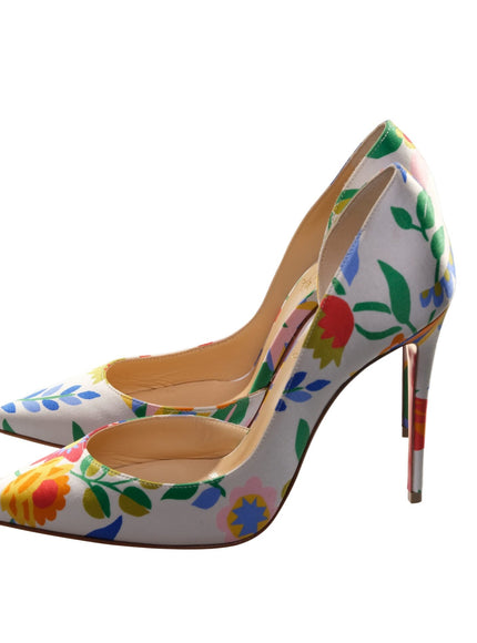 a pair of high heels with flowers painted on them