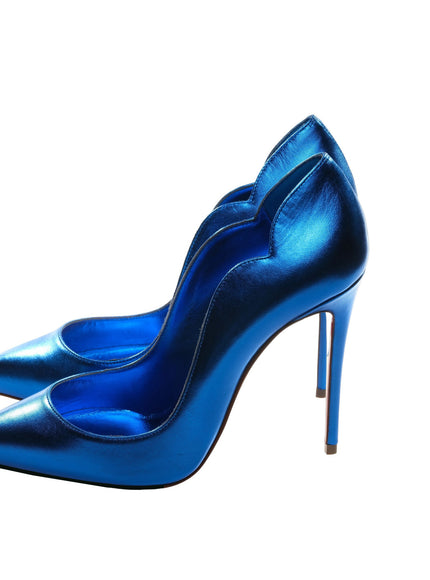 a pair of blue high heels on a white background