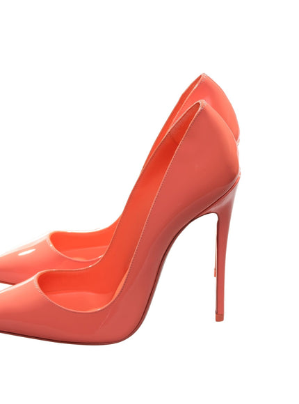 a pair of high heeled shoes on a white background