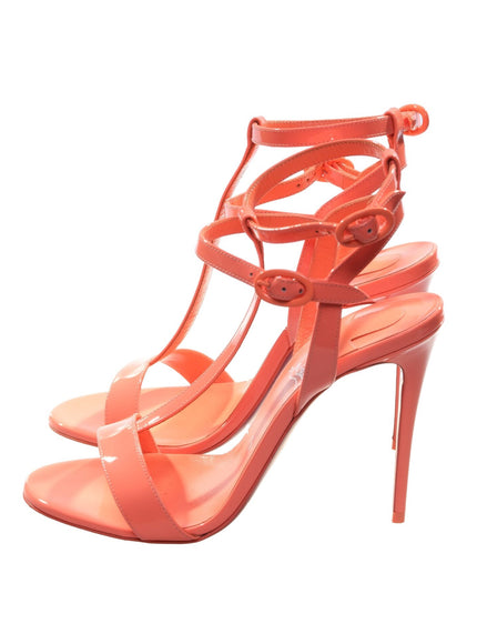 a woman's high heeled sandal with straps