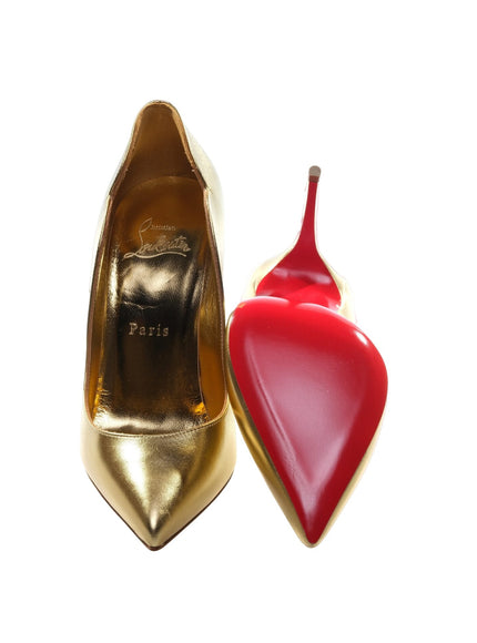 a pair of shoes with a red and gold shoe